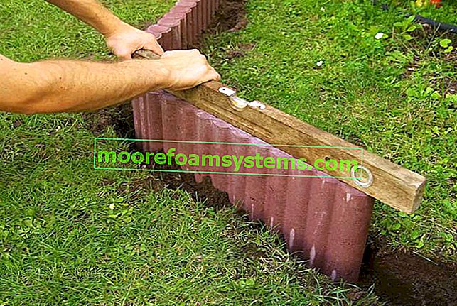 Installazione di una palizzata da giardino in cemento: un corretto livellamento è molto importante